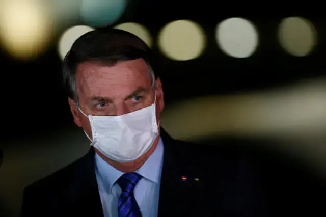 Bolsonaro ameaça jornalista A minha vontade é encher a tua boca de porrada